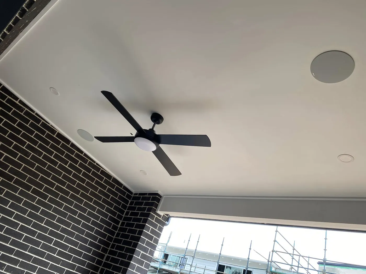 In-ceiling speaker in an outdoor alfresco ceiling